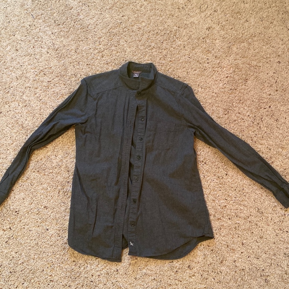 Gray button down shirt. Size medium